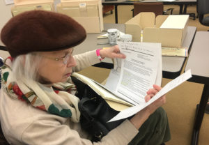 Joan Bey looked at her own bio folder, now part of the archives stored at the Indiana Historical Society. (Photo by Gena Asher)